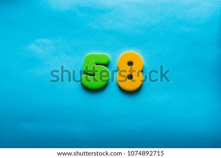 58 years old celebrating classic logo. Colored happy numbers. Greetings celebrates card. Traditional digits of ages.  Sale, birthday, special prize, % off concept.