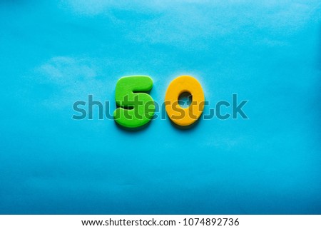 50 years old celebrating classic logo. Colored happy anniversary fifty colorful numbers. Greetings celebrates card. Traditional  digits of ages. Sale, birthday, special prize, % off concept.