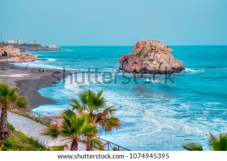 Penon del Cuervo beach. Costa del sol, Malaga, Spain Royalty-Free Stock Photo #1074945395