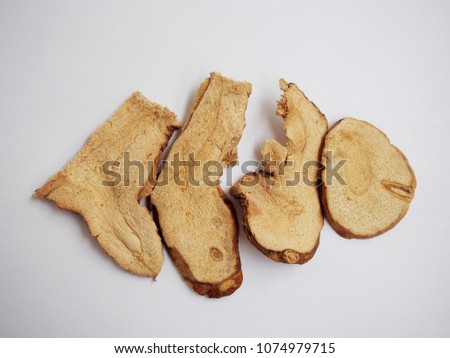 Galangal dried it is a herb for cooking soup Asian Style on white background