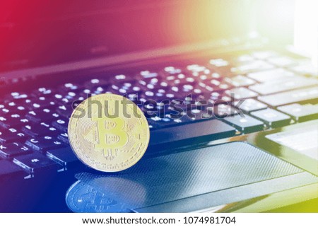 Bitcoin golden coin New virtual money on keyboard background, Crypto currency, Business and Trading concept