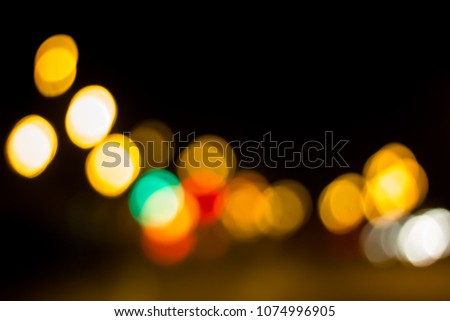 Bokeh with colorful spherical lights alternating with the background image.