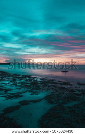 Sunrise on low tide beach in the Phillipines