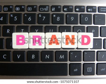 Word Brand on keyboard background