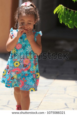 Portrait of a Happy Little Girl