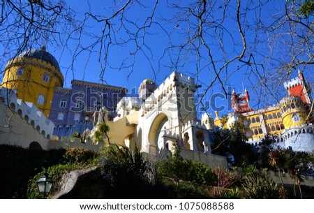 The National Palace of Pena, low angle view, colorful castle of Serra da Sintra. Stunning ans scenic view of the beautiful palace in winter