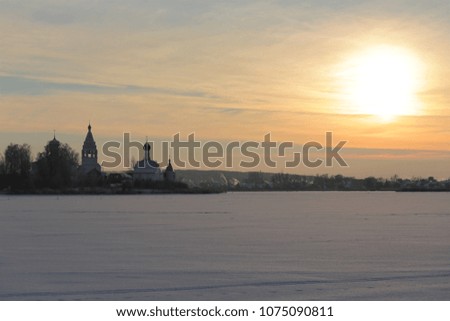 Sunset over the Church, located on the island in the middle of the lake. Nizhny Novgorod