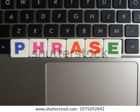 Word Phrase on keyboard background