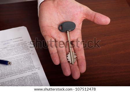 key in palm over contract