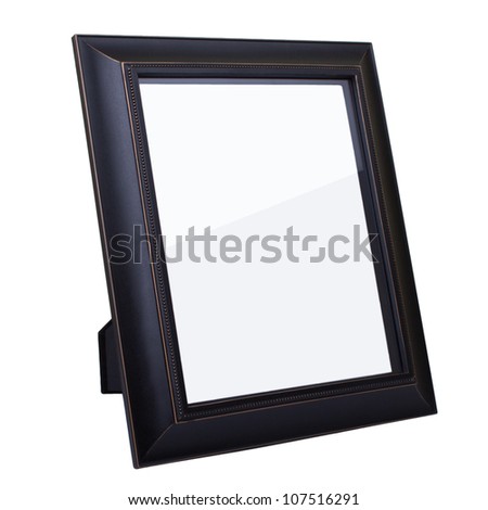 Blank dark wooden picture frame isolated on white background