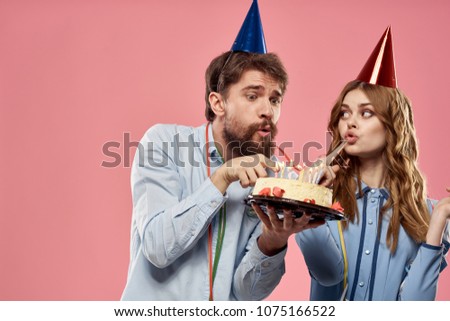 man gives a woman a cake                           