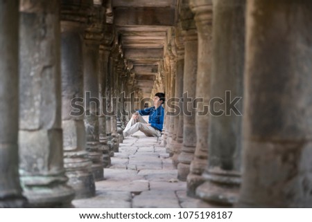 Young traveler - at Angkor Wat, Siem Reap, Cambodia