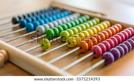 Calculate Colorful Abacus Royalty-Free Stock Photo #1075214393