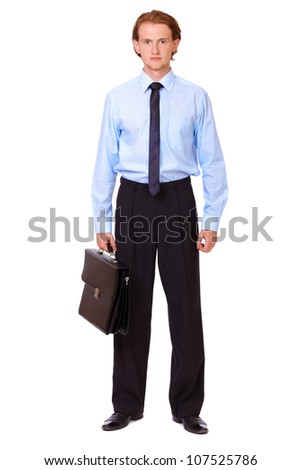 Young businessman in blue shirt with black briefcase isolated on white background
