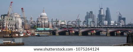 Photo of London skyline showing iconic buildings at 20 Fenchurch Street ('Walkie Talkie Building') and 122 Leadenhall Street ('Cheesegrater Building') as well as St Paul's Cathedral.