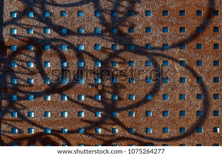 iron cloth with holes and shadows