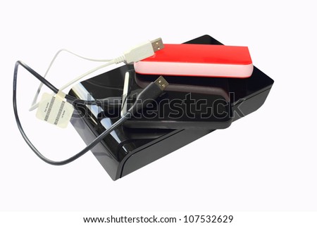 Portable external hard drives for backing up files isolated on a white background using clipping path