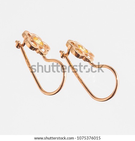 gold earrings fashion stylish elegant white background