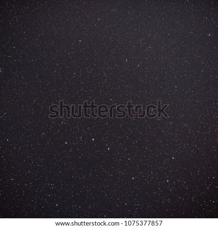 Night sky with a bright star in the constellation Ursa Major. View of the starry space.
