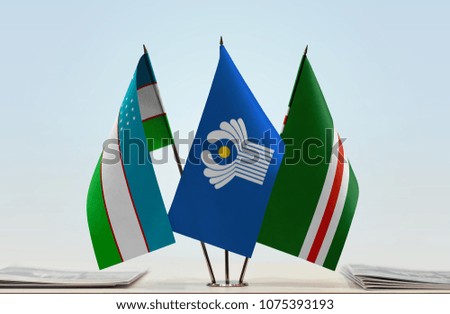 Flags of Uzbekistan CIS and Chechen Republic of Ichkeria. Cloth of flags is 3d rendering, the rest is a photo.