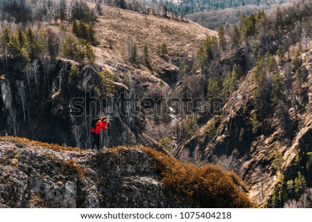 Photographer in the mountains. Traveler in the mountains. Photo tours. Camping trip. Tours in the mountains. Professional photographer. National Geographic. Photojournalist. Photo artist