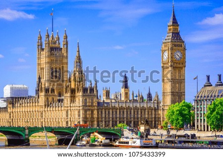 London, The United Kingdom of Great Britain: Palace of Westminster with Elizabeth Tower and Westminster Bridge, over the Thames river.