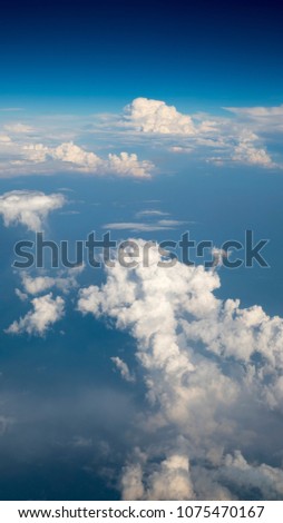 Blue Sky and Clouds on airplan
