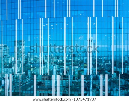 cityscape reflection on a glass facade modern office Building in Kiev