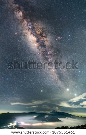 Beautiful milky way over mount Bromo in Bromo Tengger Semeru National Park, East Java, Indonesia. Long exposure photography.  Nature background. Night landscape photography.
