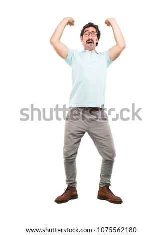 young crazy man pushing or holding sign.full body cutout person against white background