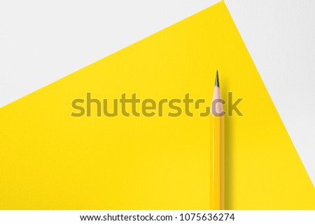 Presentation template with copy space by top view close up macro photo of yellow pencil put on texture white paper and combine with yellow right angle shape. Flash light made smooth light on pencil.