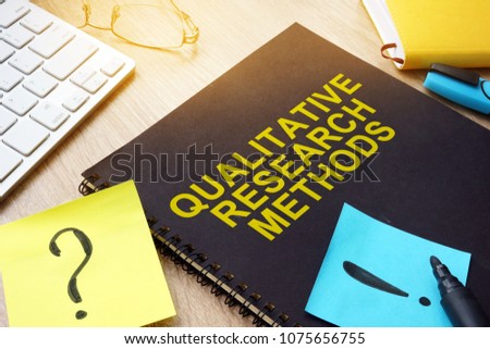 Qualitative research methods and sticks on a desk. Royalty-Free Stock Photo #1075656755