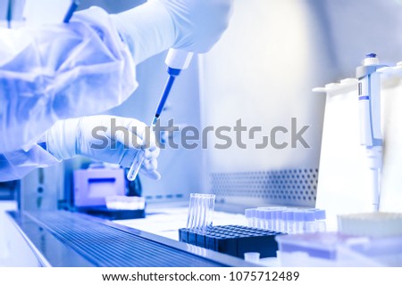 The scientist experimented in the laboratory Royalty-Free Stock Photo #1075712489