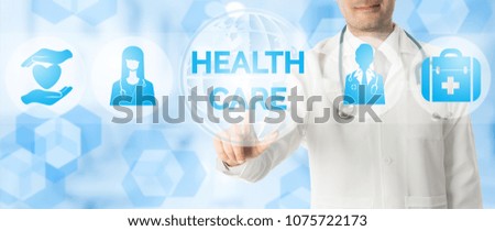 Medical Concept - Doctor points at HEALTHCARE with other icons showing medical symbol of medicine, hospital people and research on blue abstract background.