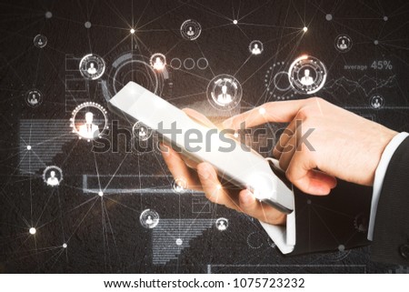Side view of businessman hands using glowing tablet with abstract polygonal interface. Communication and network concept 