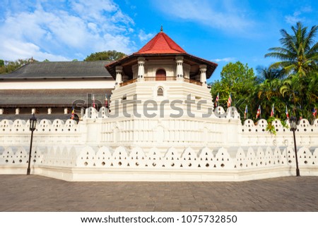 Temple of the Sacred Tooth Relic or Sri Dalada Maligawa in Kandy, Sri Lanka. Sacred Tooth Relic Temple is a Buddhist temple located in the royal palace complex of the Kingdom of Kandy. Royalty-Free Stock Photo #1075732850