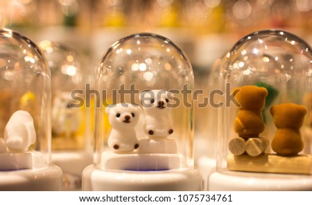 Cute animal toy model in glass