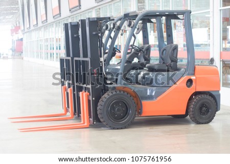electrical forklift truck for service indurtrail container transport store heavy weight Royalty-Free Stock Photo #1075761956