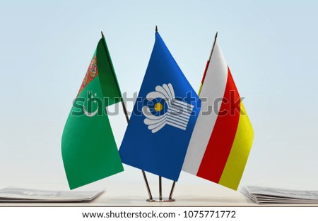 Flags of Turkmenistan CIS and South Ossetia. Cloth of flags is 3d rendering, the rest is a photo.