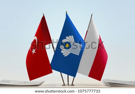 Flags of Turkey CIS and Poland. Cloth of flags is 3d rendering, the rest is a photo.