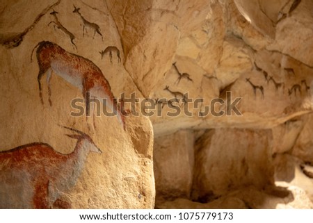 African, primitive, cave painting on stones.