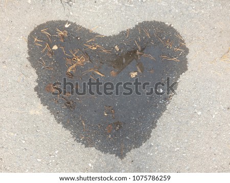 Heart shape puddle closeup