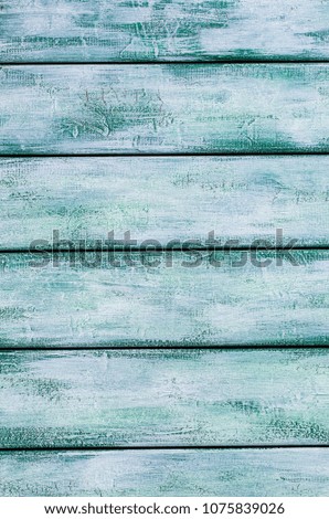 Copy space wooden background painted with different paint.