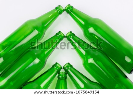 Flay lay, green bottle isolated white background for packing water and alcohol.
