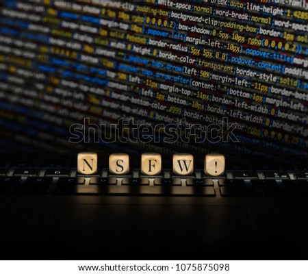 Nsfw word on wooden cubes. Nsfw concept Royalty-Free Stock Photo #1075875098