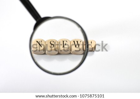 Nsfw word on wooden cubes. Nsfw concept Royalty-Free Stock Photo #1075875101