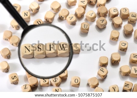 Nsfw word on wooden cubes. Nsfw concept Royalty-Free Stock Photo #1075875107