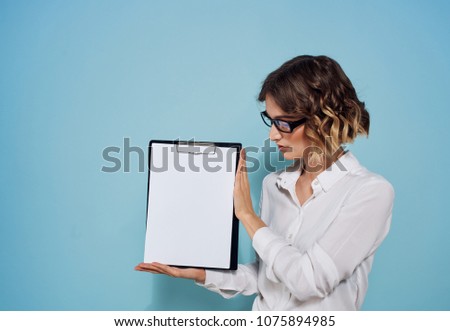 woman with a document tablet                              