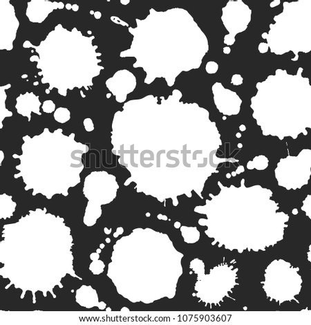 Vector seamless abstract pattern with white paints blots. Based on hand made inky artwork. White on black background. Clipping paths included.  