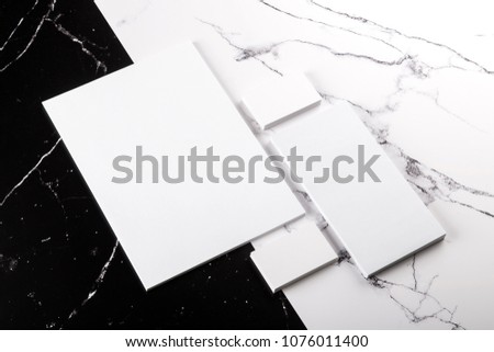 Photo of branding identity mock up on marble. Template isolated on marble background. For graphic designers presentations and portfolios marble premium luxury mock-up
